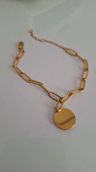Pulsera Parfois ojo dorado y negro
