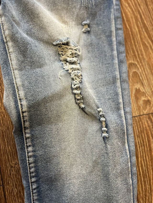 Jeans uomo strappati blu