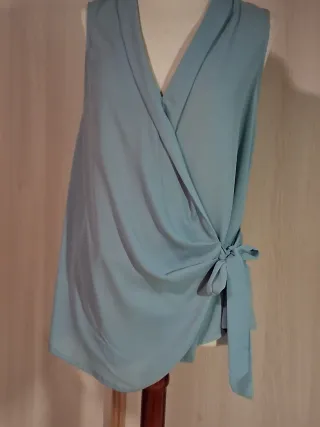 Blusa fluida azul celeste poliéster