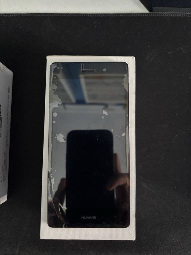 Huawei P8 lite - Caja abierta, móvil precintado
