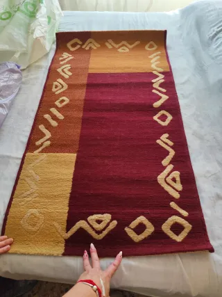 Alfombra decorativa para sillón o cama