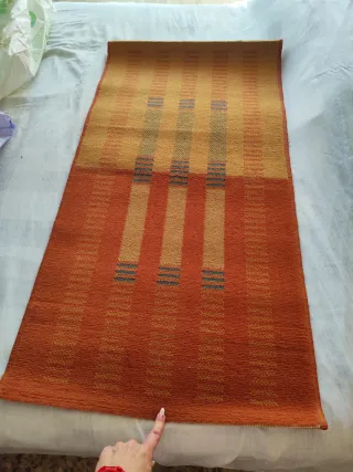 Alfombra decorativa para sillón o cama