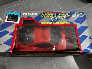 Coche teledirigido deportivo rojo 1/10