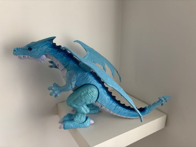 Dragón azul con movimiento y sonido para niños