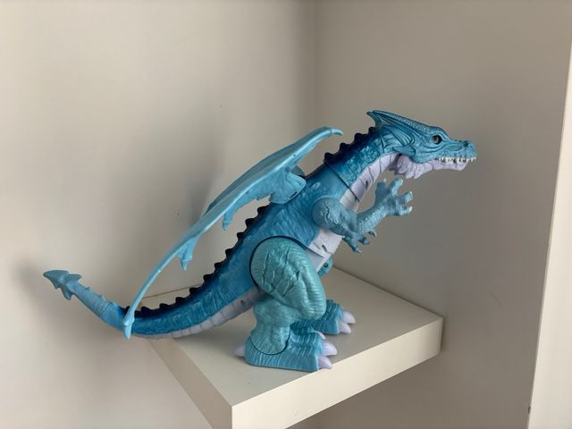 Dragón azul con movimiento y sonido para niños