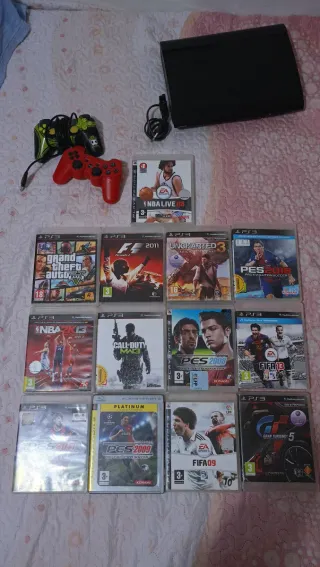Consola PS3 con 2 mandos y juegos