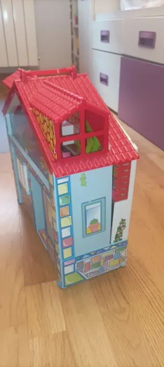 Casa de Muñecas Barriguitas con accesorios.