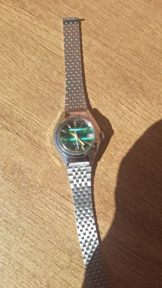 Reloj mujer esfera verde y correa plateada