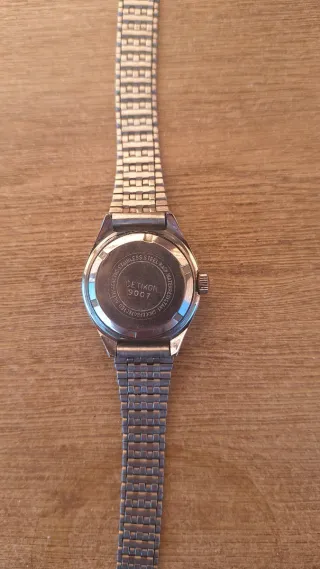 Reloj mujer esfera verde y correa plateada