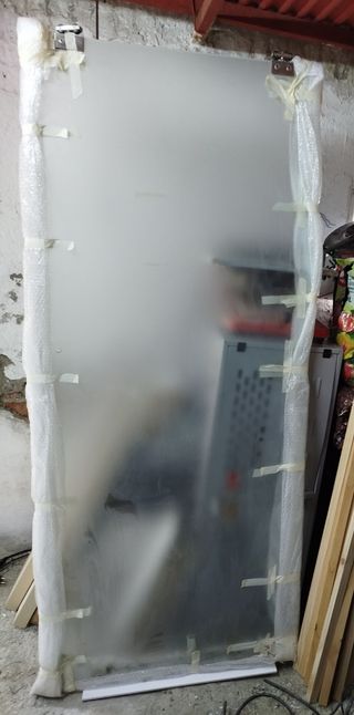 Puerta corredera de cristal