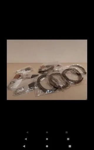 Pulsera cuero trenzado y llavero metal