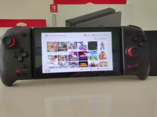 Nintendo Switch + juegos y accesorios