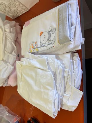 ropa minucuna
2 protectores
3 juegos
1 mant