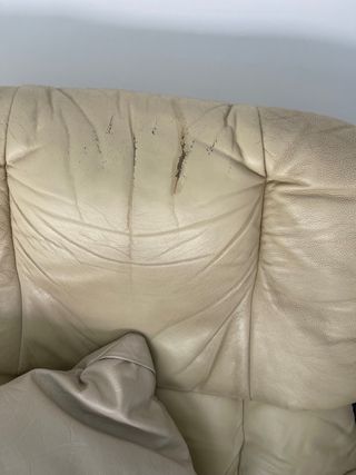 Sillón reclinable de piel beige