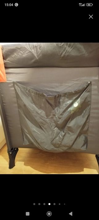 Cuna de viaje plegable con mosquitera.
Sin colchón