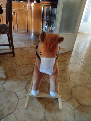Cavallino a dondolo peluche