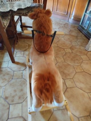 Cavallino a dondolo peluche