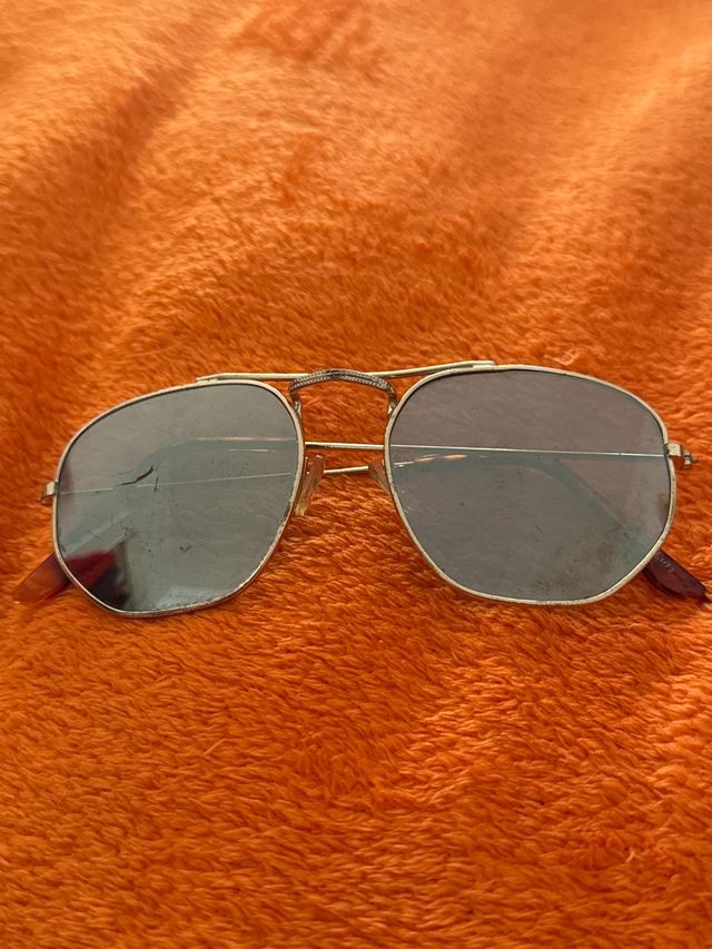 Gafas de sol vintage doradas y plateadas