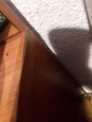 Mueble de madera con espejo