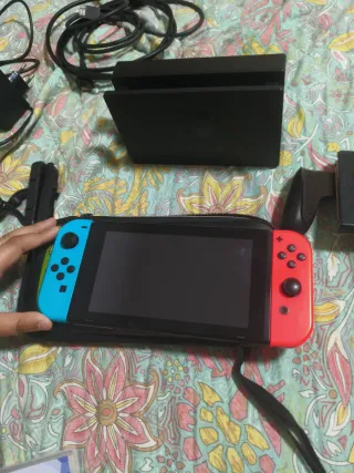 Nintendo Switch Roja + Juegos mando pro y todo 