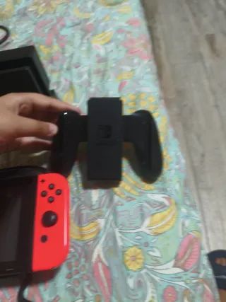 Nintendo Switch Roja + Juegos mando pro y todo 