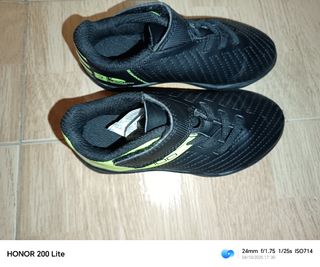 Botas de fútbol Kipsta niños negro/verde