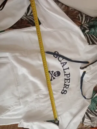 No rebajo mas. Sudadera Scalpers Blanca y Negra Nu