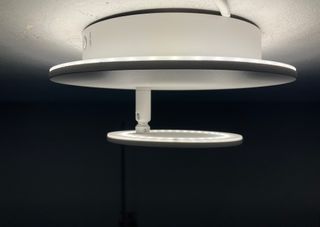 Lampada parete bianco Led effetto "eclisse"
