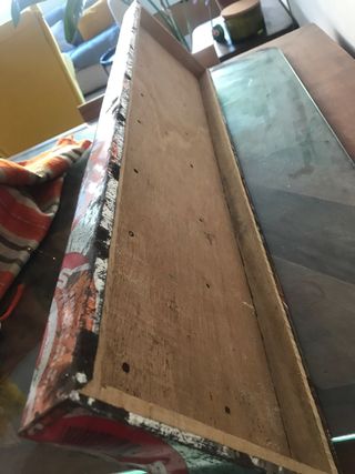 Organizador de pared. reciclaje latas africano