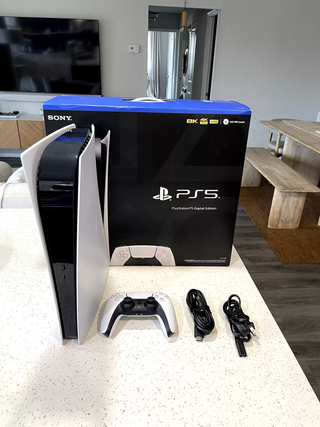 PS5 Digital + mando original + caja y ticket