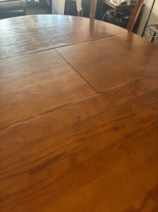 Mesa de comedor redonda de madera