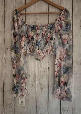 Top floral manga larga