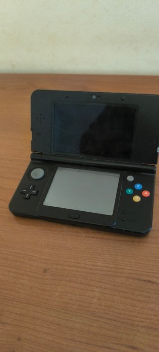 Nintendo 3DS Roja Mario con juegos