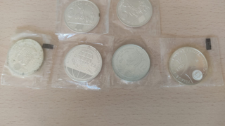 2000 Pesetas y 12 € de Plata de España