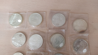 2000 Pesetas y 12 € de Plata de España