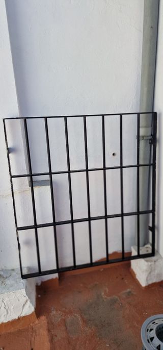 Ventana aluminio y reja 