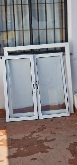 Ventana aluminio y reja 