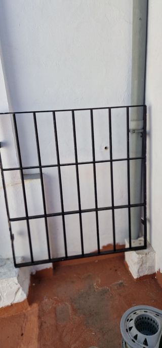 Ventana aluminio y reja 