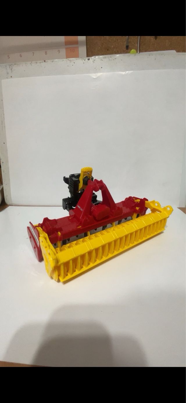 Grada de discos Pöttinger 1:16 Brude