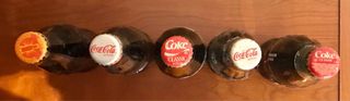 Bottiglie di Coca Cola provenienti da diversi paesi