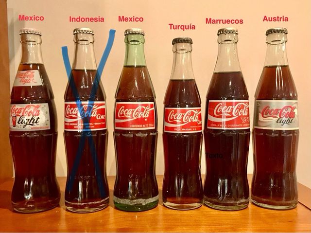 Bottiglie di Coca Cola provenienti da diversi paesi