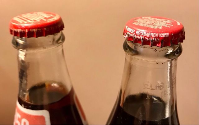 Bottiglie di Coca Cola provenienti da diversi paesi