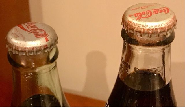 Bottiglie di Coca Cola provenienti da diversi paesi