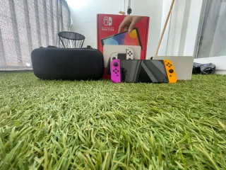 
Nintendo Switch OLED + funda+mandos edición neon
