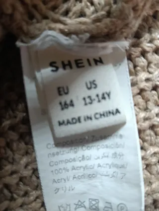 Jersey beige cuello alto. Shein