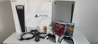 PlayStation 5 con 2 mandos y juegos