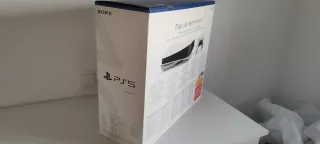 PlayStation 5 con 2 mandos y juegos