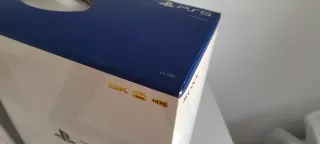PlayStation 5 con 2 mandos y juegos
