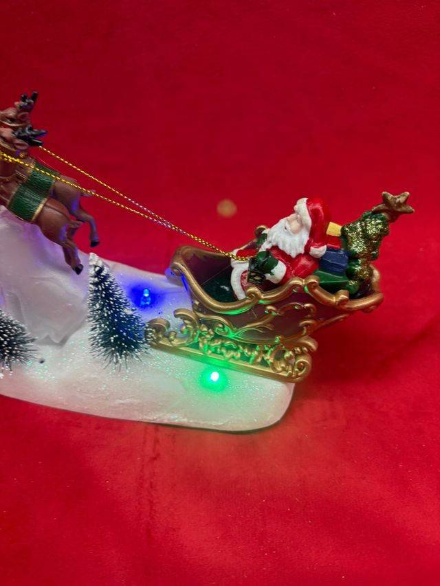 Slitta Babbo Natale con renne e luci