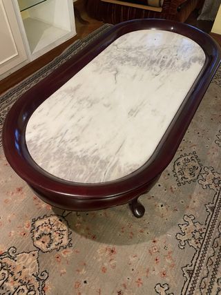 Mesa de centro ovalada con mármol y madera